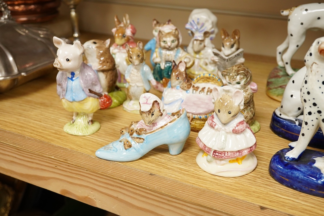 A collection of Beatrix Potter figures, three Staffordshire Dalmatians and a Copenhagen Dalmatian, tallest 16cm high